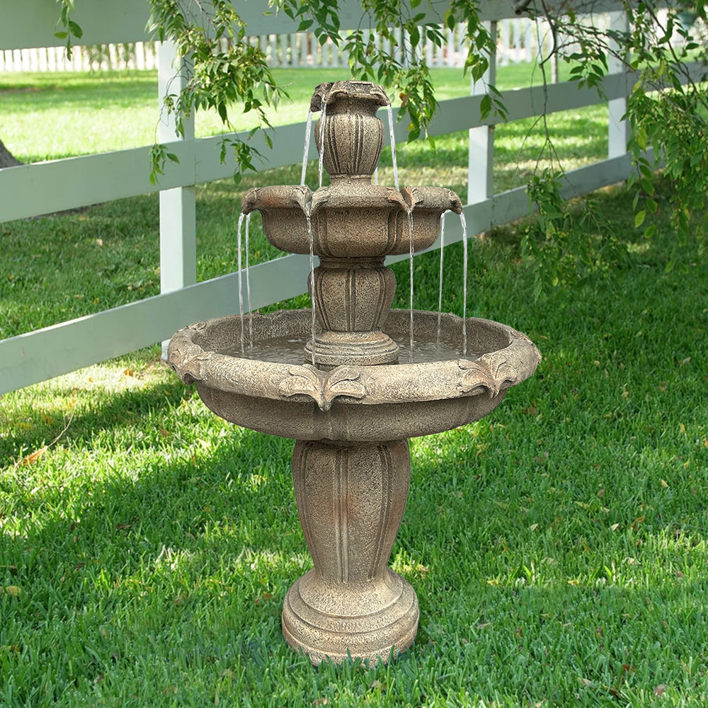 48H 3-tier concrete outdoor water fountain acting as an elegant focal point on a green lawn.