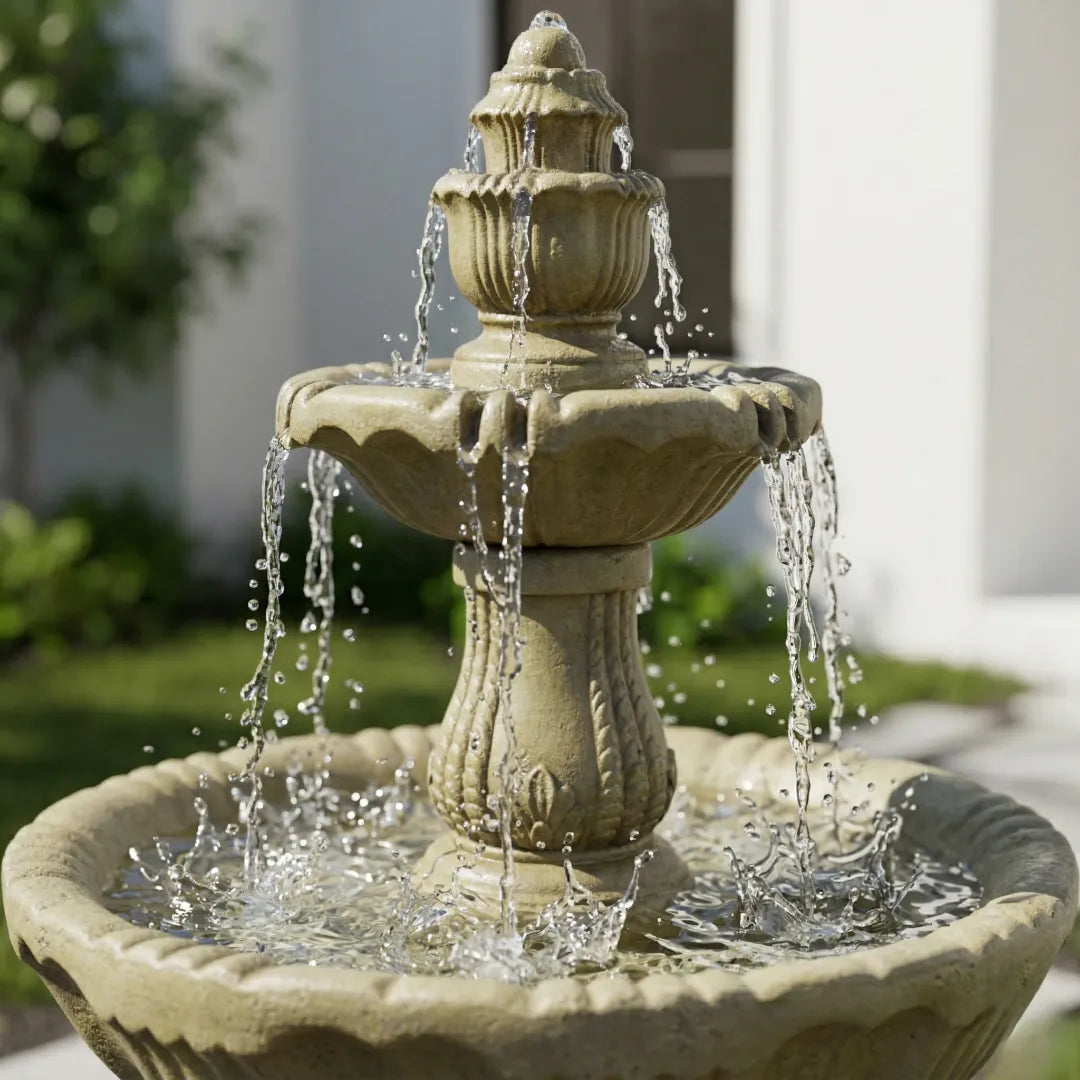 Close-up of clear water cascading and splashing dynamically down the tiers of a classic stone fountain.