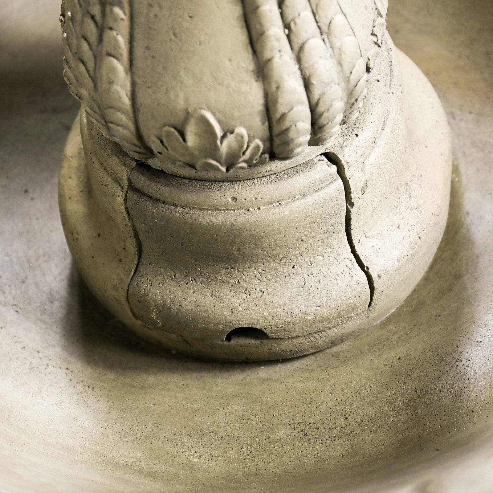 Detailed view of the thick and stable 35.185kg pedestal base of the classic outdoor fountain.