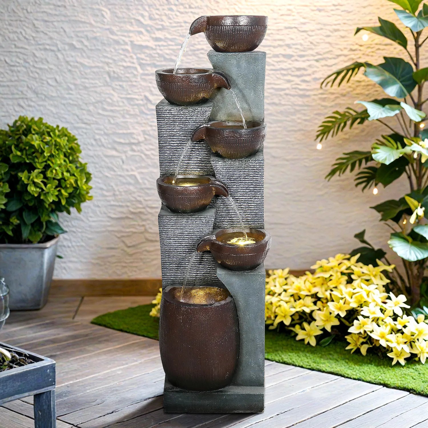 Modern 53.5-inch 6-tier bowl fountain with brick texture on a decorative outdoor patio.
