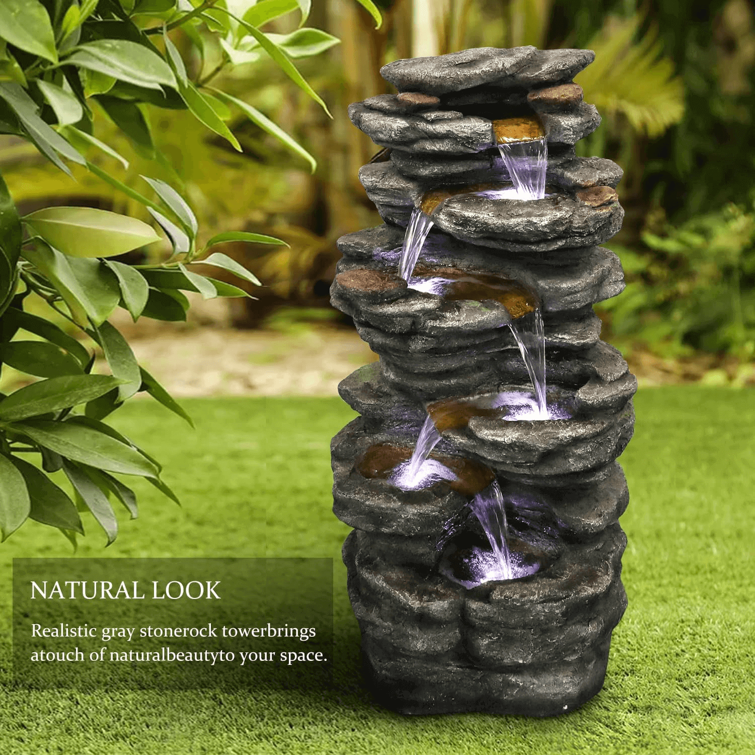 Natural-looking outdoor water fountain blending perfectly into a lush flower garden