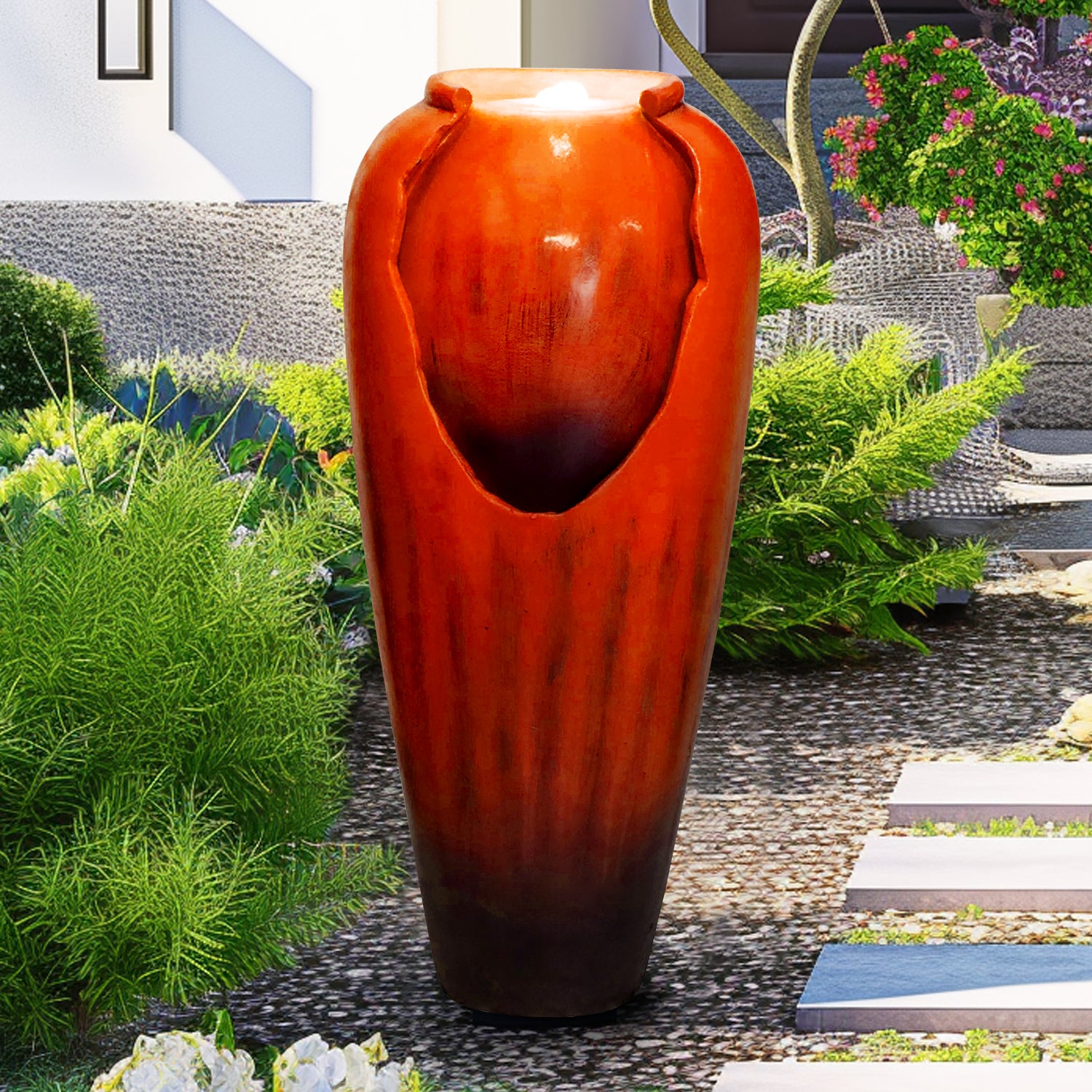 Striking red concrete vase fountain along a peaceful garden pathway