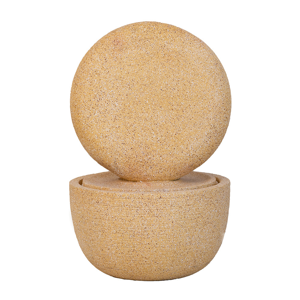 Cream concrete ring fountain rear view showing the plain back of the disc