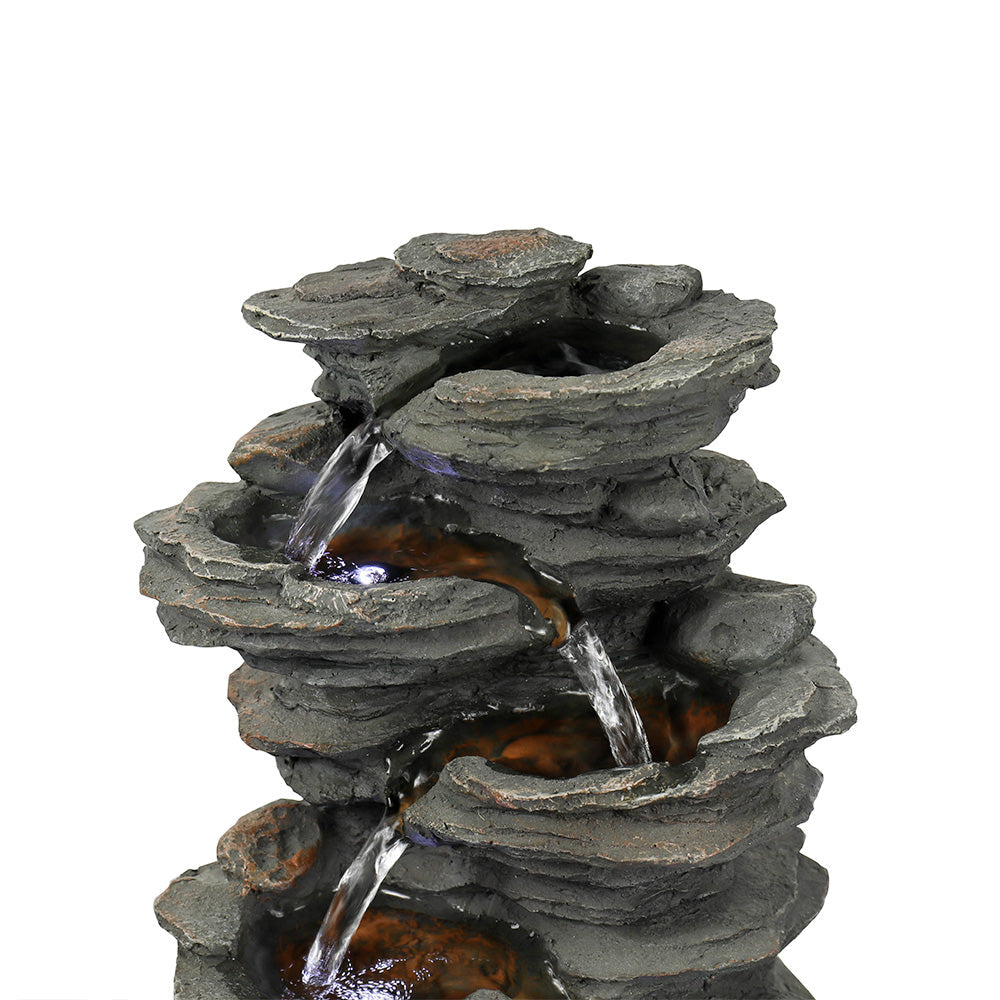 Resin 6 Tier Slate Tabletop Water Fountain 15 Inch in garden setting