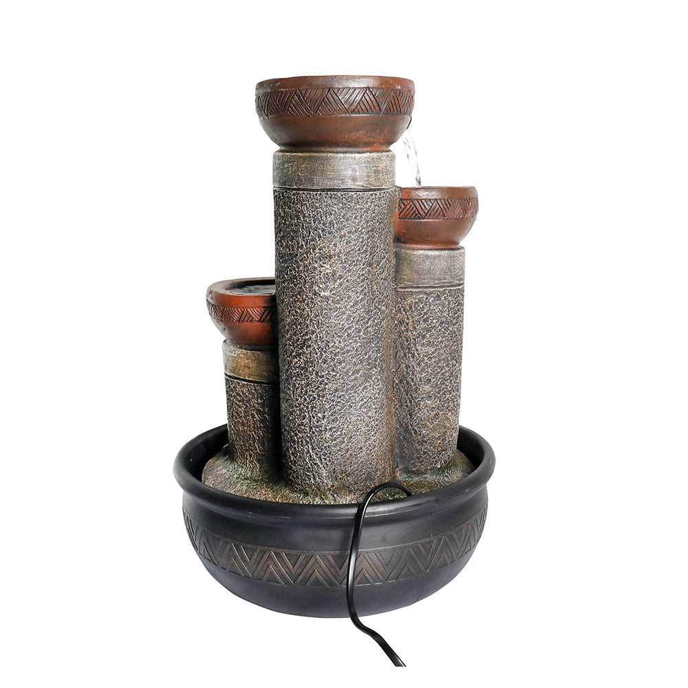 Direct rear view of the active fountain showing the power cord exiting from the center back base.