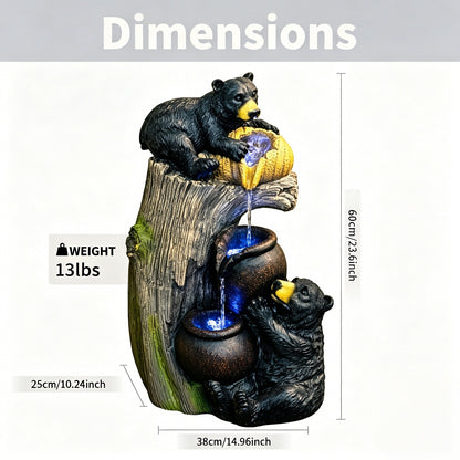 Resin Black Bear Outdoor Water Fountain LED lit at night