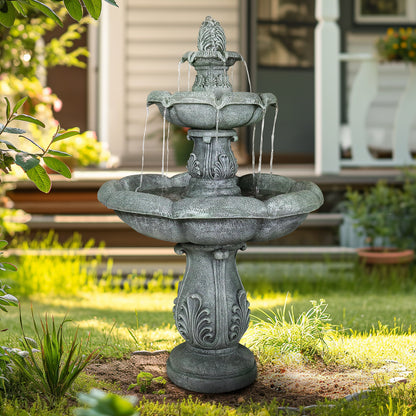 48"H elegant classic outdoor water fountain serving as a stunning focal point in a garden bed.