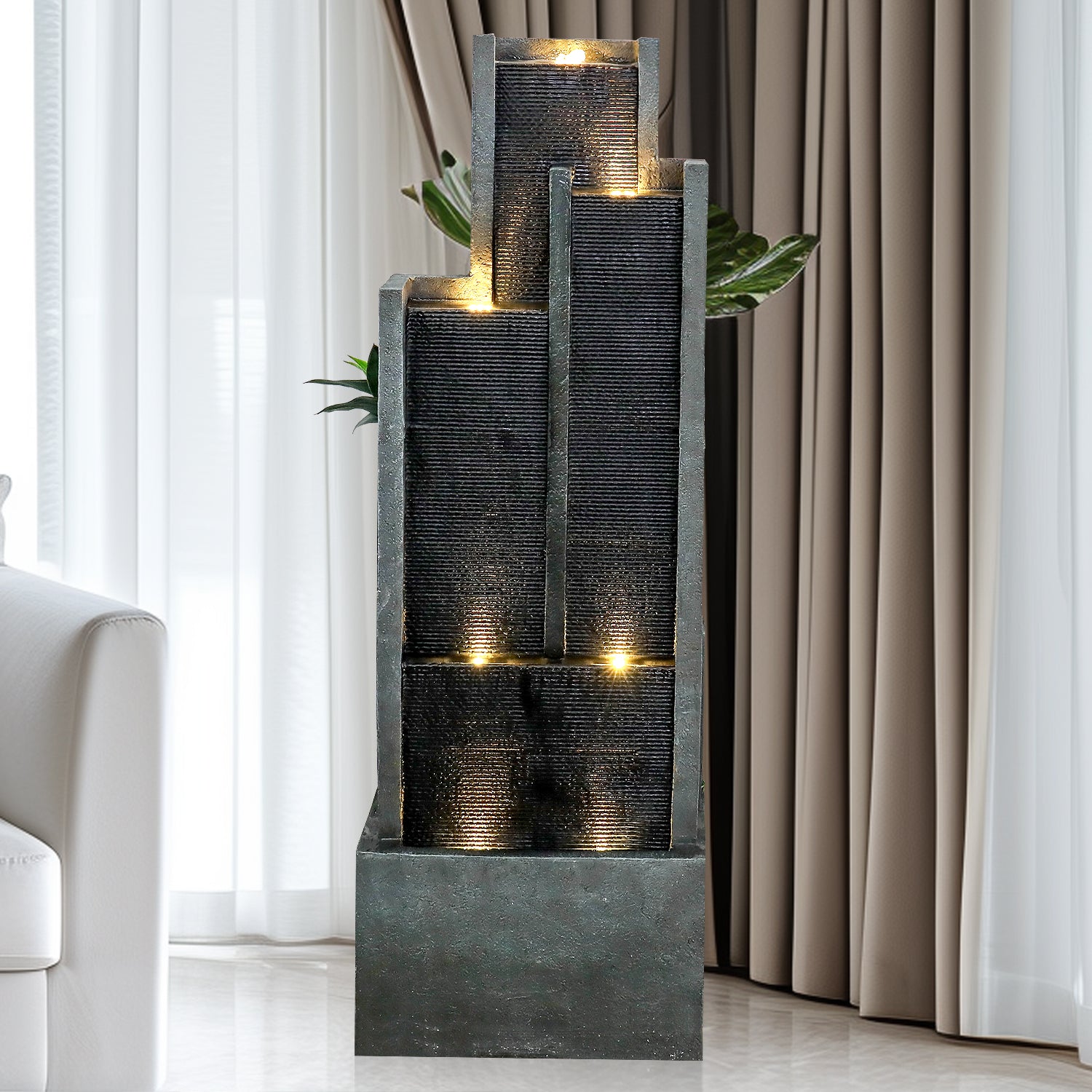 50.7" tall modern cascading water fountain with a sound whisper effect in a cozy living room.