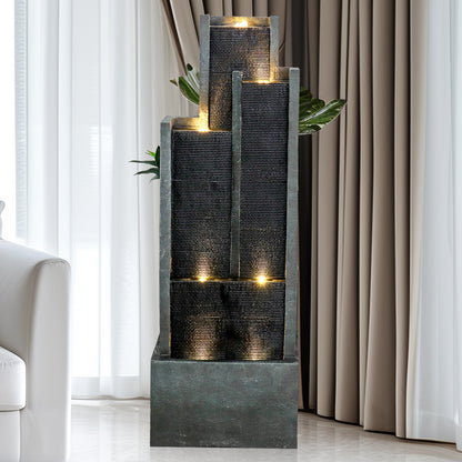 50.7" tall modern cascading water fountain with a sound whisper effect in a cozy living room.