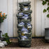 51-inch tall multi-tier cascading rock fountain bringing tranquil natural beauty to a garden