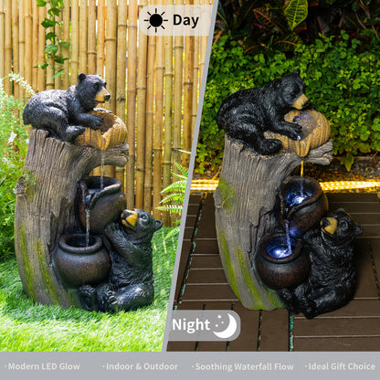 Resin Black Bear Outdoor Water Fountain LED lit at night