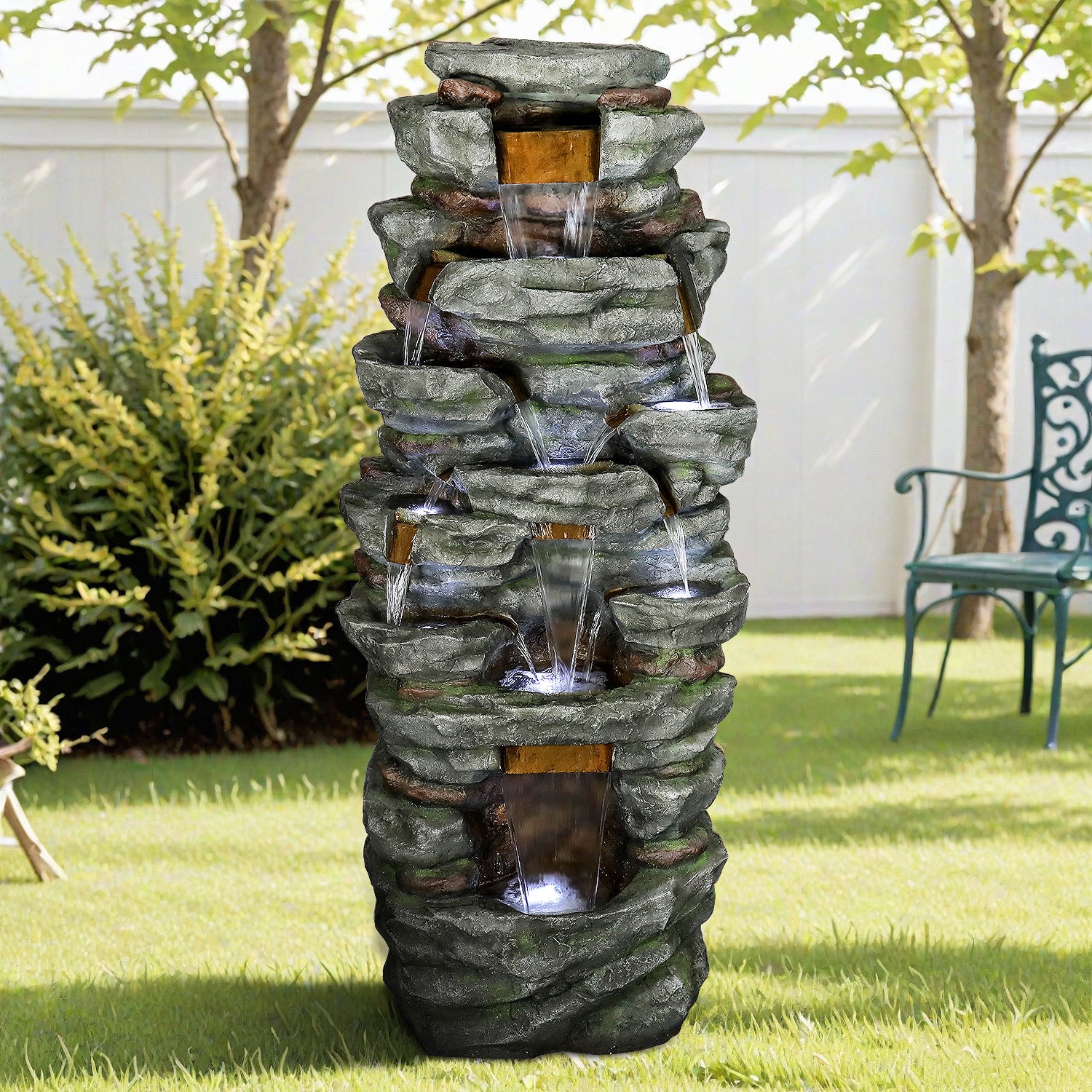 79-inch tall multi-tier rock fountain in a beautiful outdoor landscape