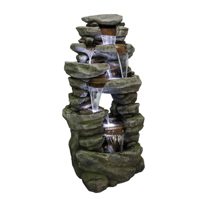 Angled view of the 60"H 7-tier cascading rock outdoor water fountain on white.