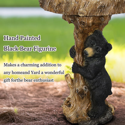 Black bear tree stump bird bath design showing a 2.1-gallon water basin capacity.