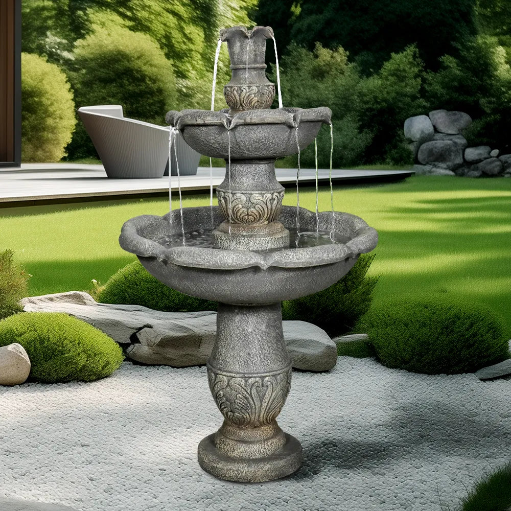 Classical 48.4-inch 2-tier flowerpot-shaped concrete fountain in a manicured green garden setting.