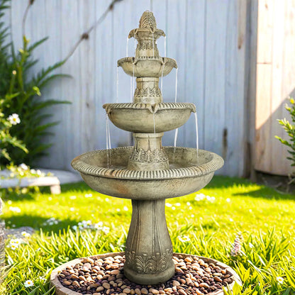 Classical tiered cascading water feature placed against a neutral outdoor wall.