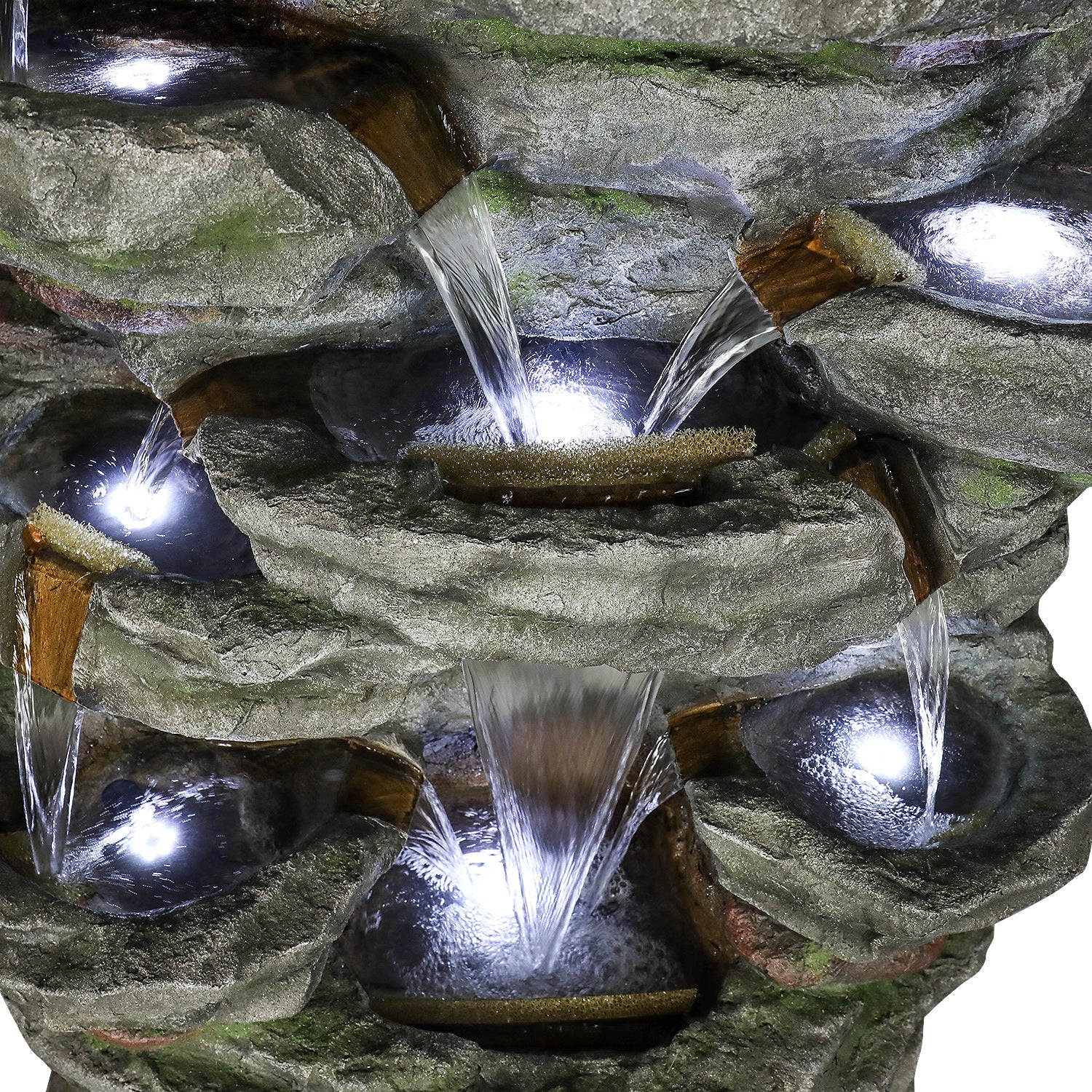 Close-up of soothing water cascading down realistic rock tiers