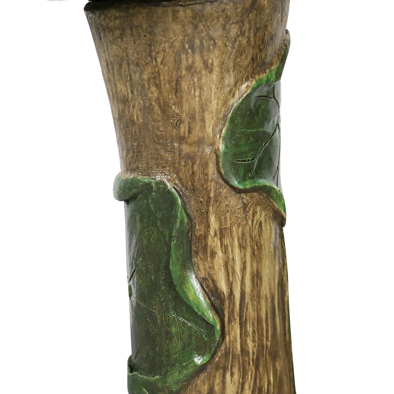 Close-up of the durable concrete pedestal designed to look like a natural forest tree trunk.