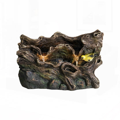 Close-up of the rock fountain on a white background, focusing on flowing water and simulated goldfinches.