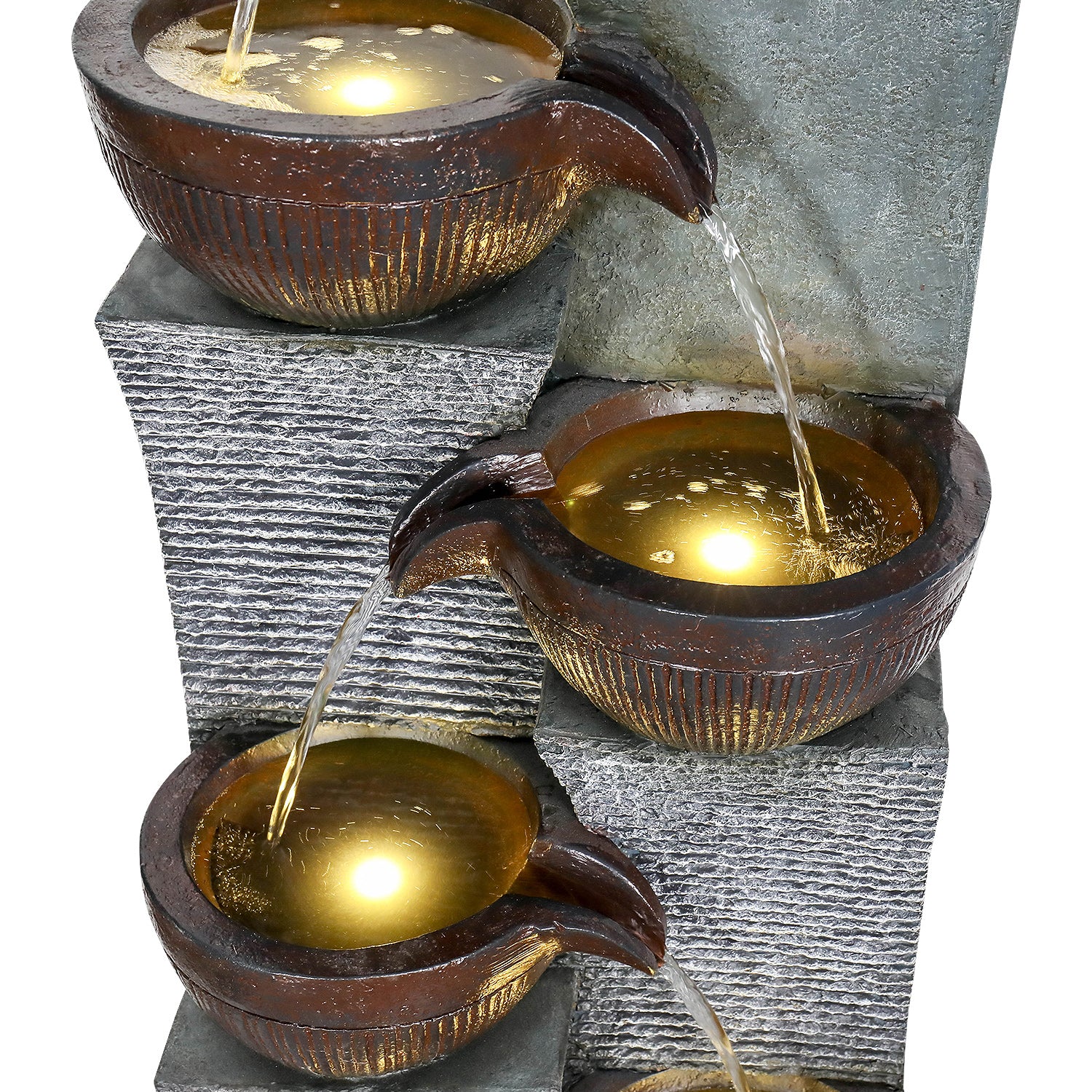 Close-up of the soothing water cascading through the LED illuminated bowls