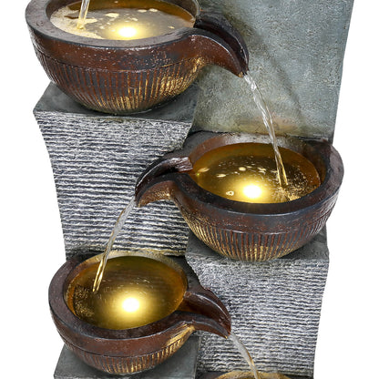Close-up of the soothing water cascading through the LED illuminated bowls