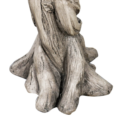 Close-up of the sturdy tree-root style base of the classical goddess concrete pedestal.