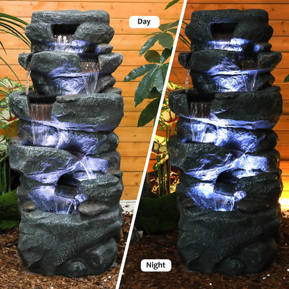 Comparison view of the 5-tier concrete fountain in daylight versus illuminated by LED lights at night.