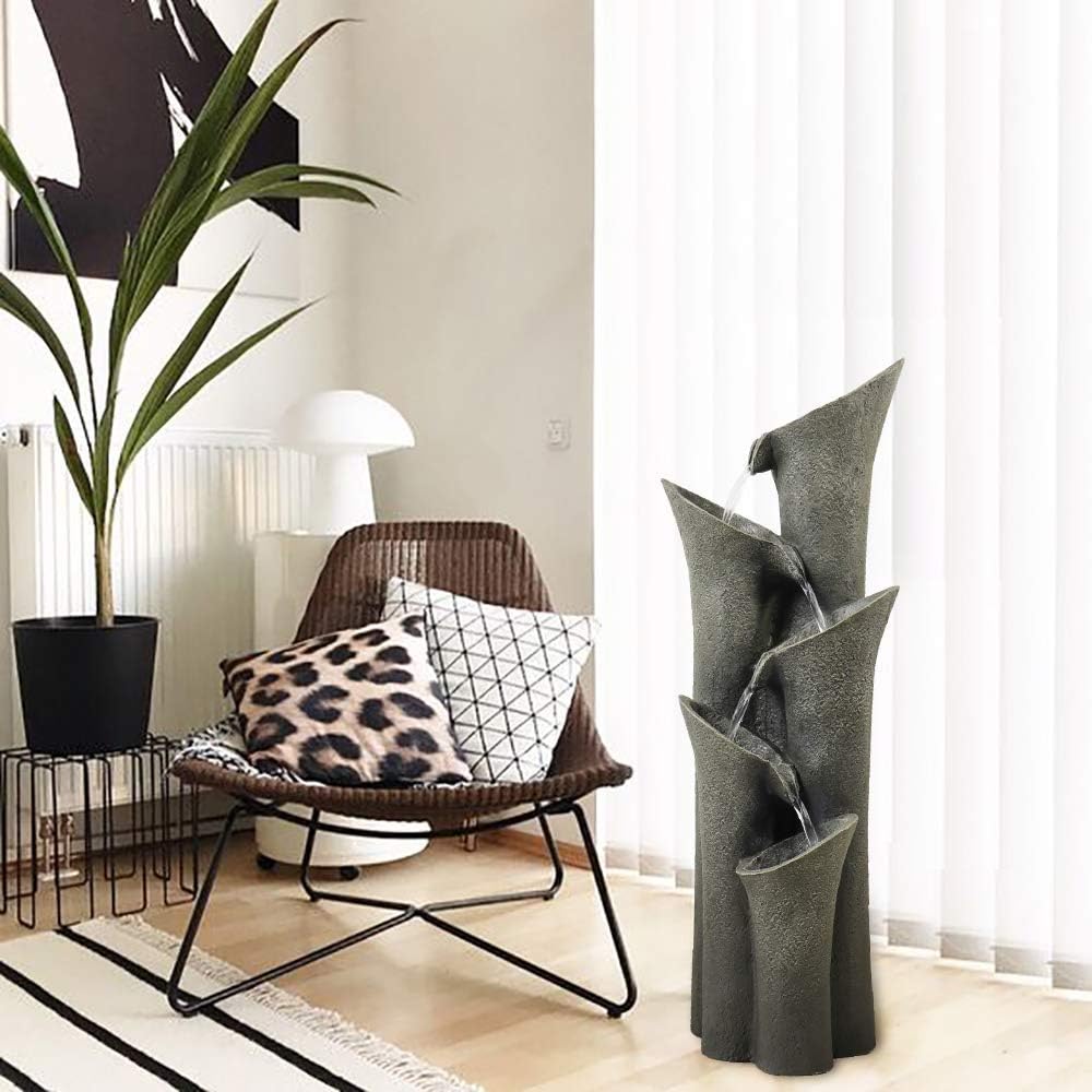 Contemporary floor fountain acting as a soothing focal point in an indoor living room
