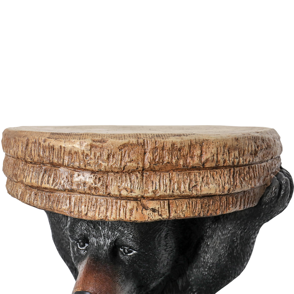 Detail showing the realistic faux wood grain finish on the cement table top