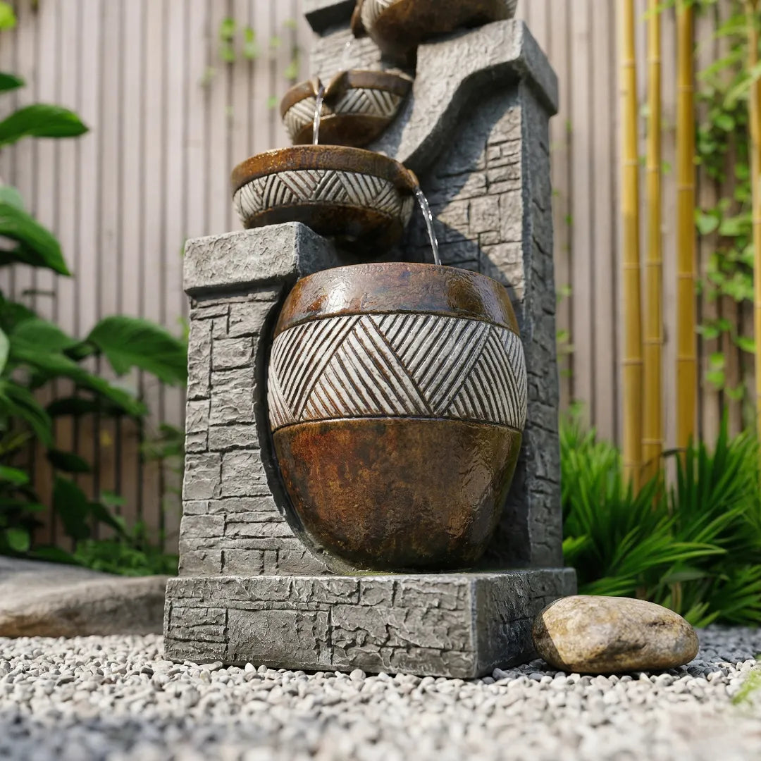 Detailed view of the glossy, richly glazed finish on a durable resin urn fountain.