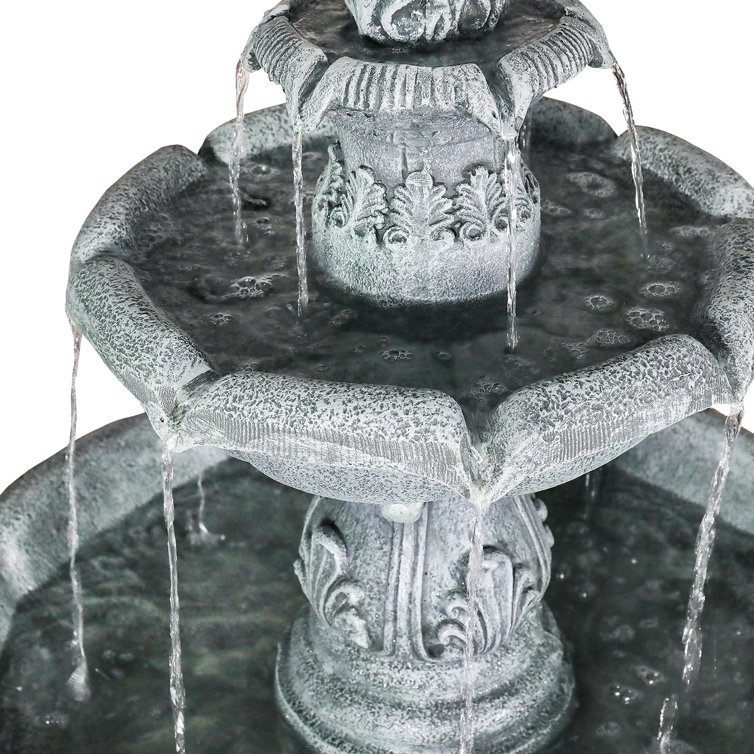 Detailed view of the intricate ornate craftsmanship on the tiers of the classic garden fountain.
