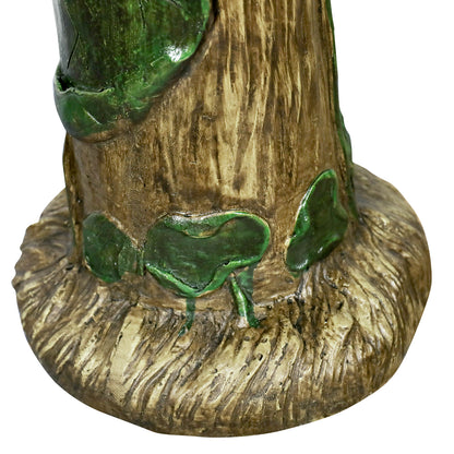 Detailed view of the realistic green vine accents and bark texture on the sturdy birdbath base.