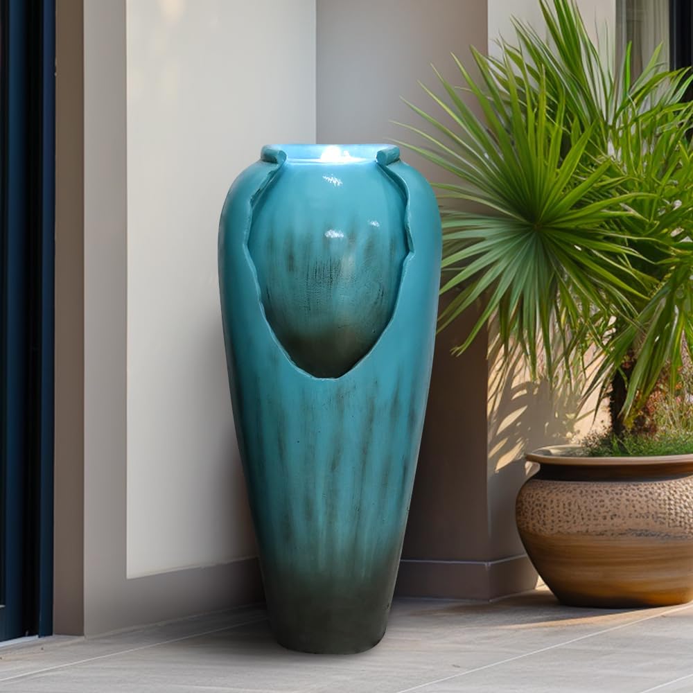 Elegant light blue vase fountain decorating a classic front porch