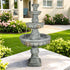 Grand 59.5-inch 3-tier GFRC fountain as a focal point in a lush landscaped garden.