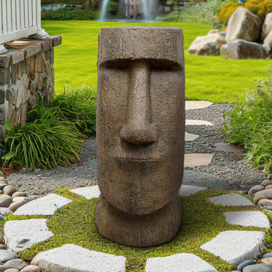 Iconic stone-look Moai statue standing as a focal point on a lawn