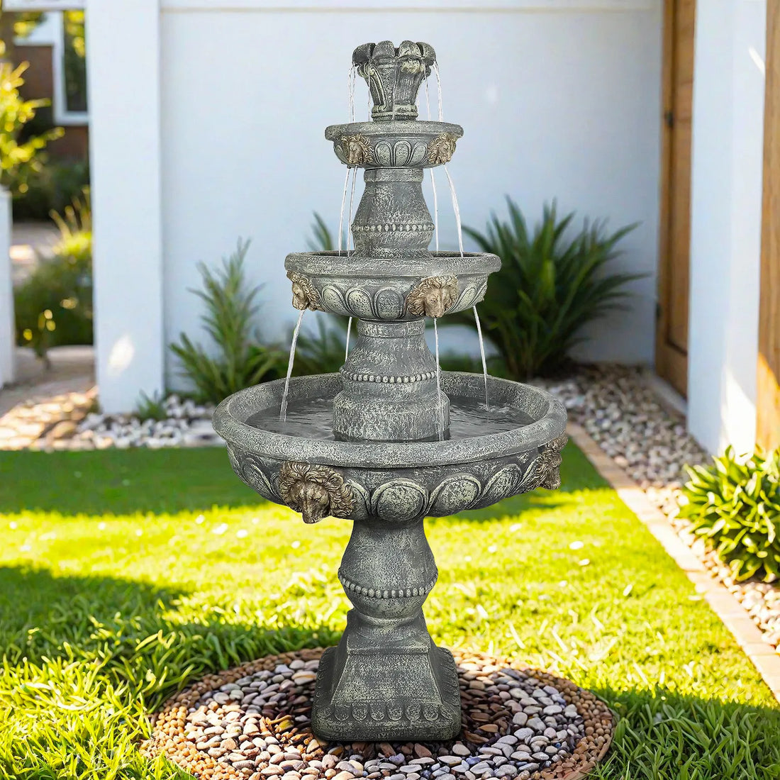 Large architectural standing waterfall fountain on a spacious lawn