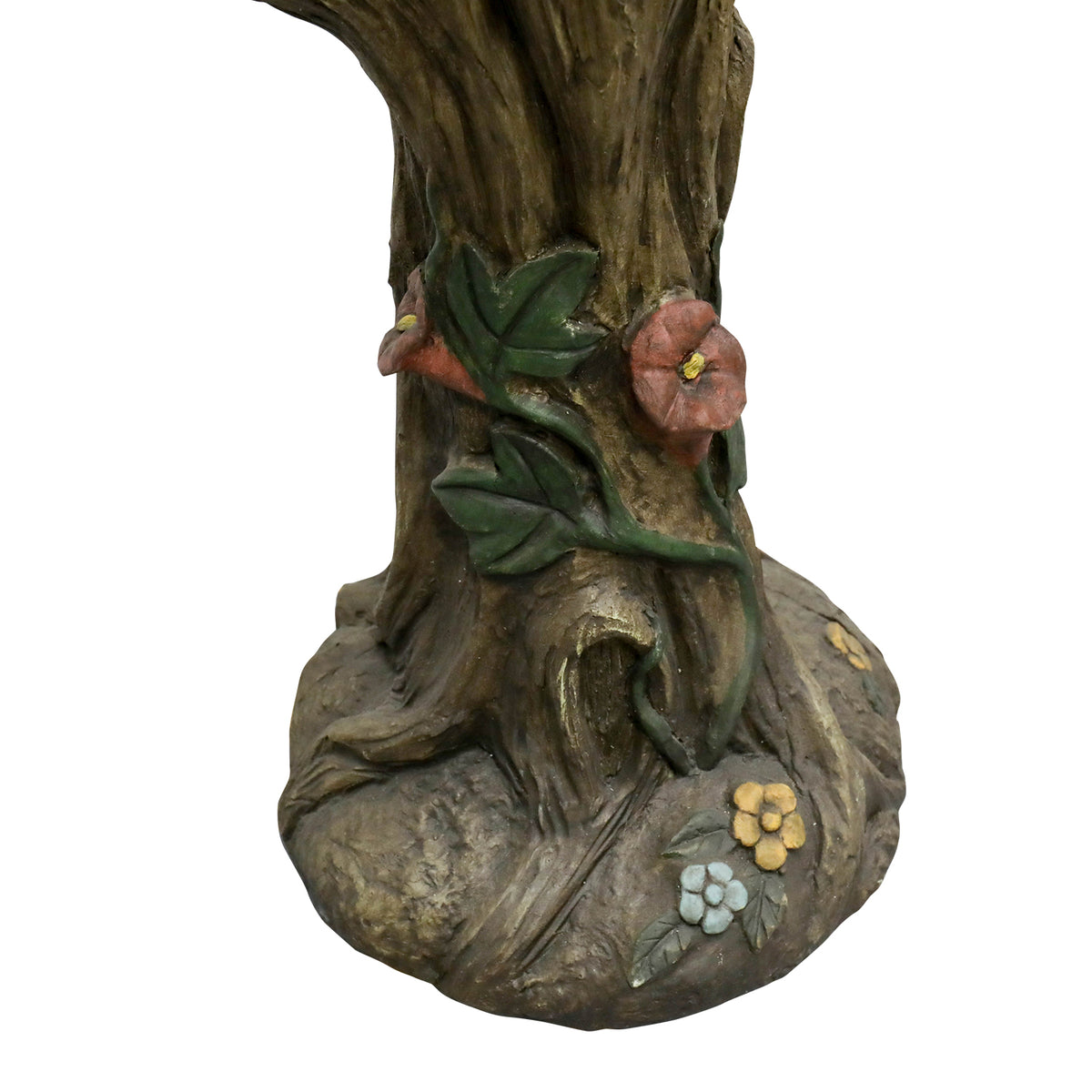 Macro shot of the sturdy concrete base with molded flowers and tree roots.