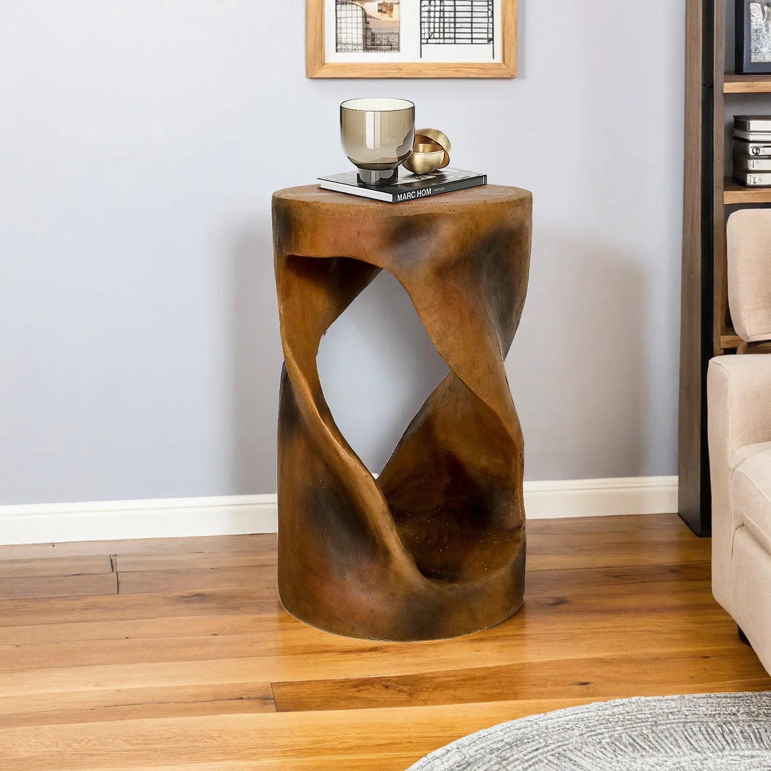 Modern 19.6-inch spiral pedestal concrete end table with an open-center design in a living room.