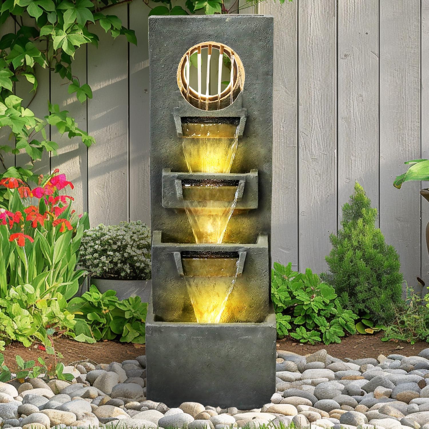 Modern Four-Tier Fountain in a Pebble Garden