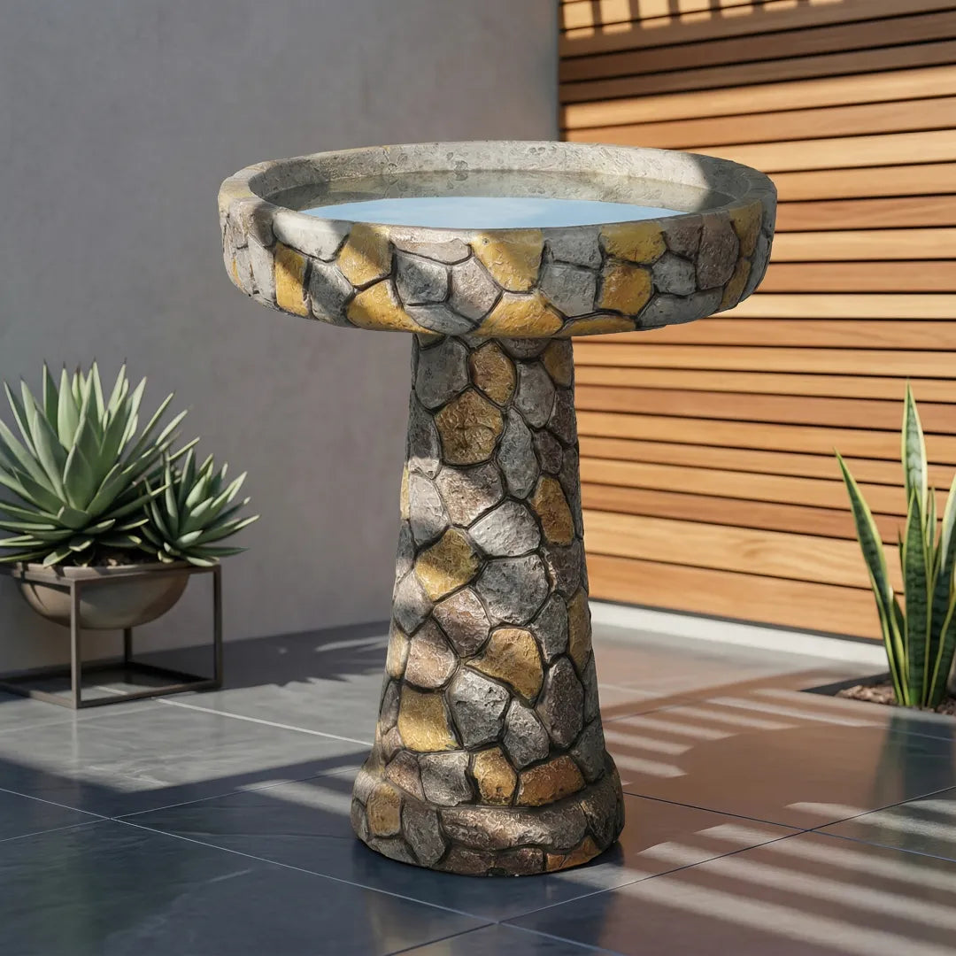 Modern concrete bird bath with geometric design for outdoor patio