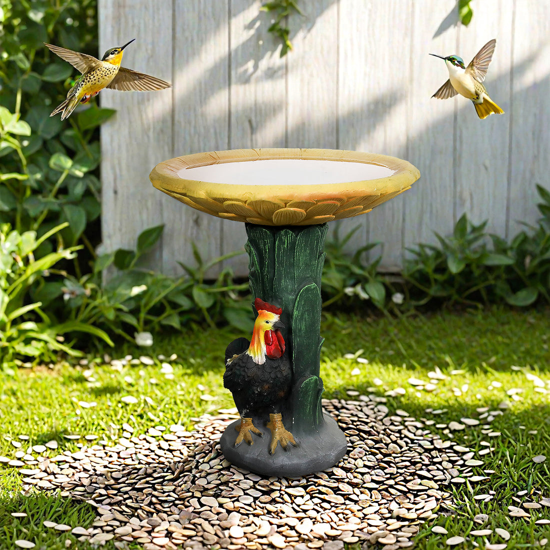 Outdoor scene of the rustic sunflower concrete bird bath decorating a backyard patio.