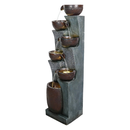 Side profile of the tall, rustic pottery-inspired freestanding fountain on white