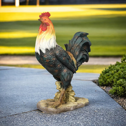 Side view of the concrete rooster garden ornament displayed on a green lawn.