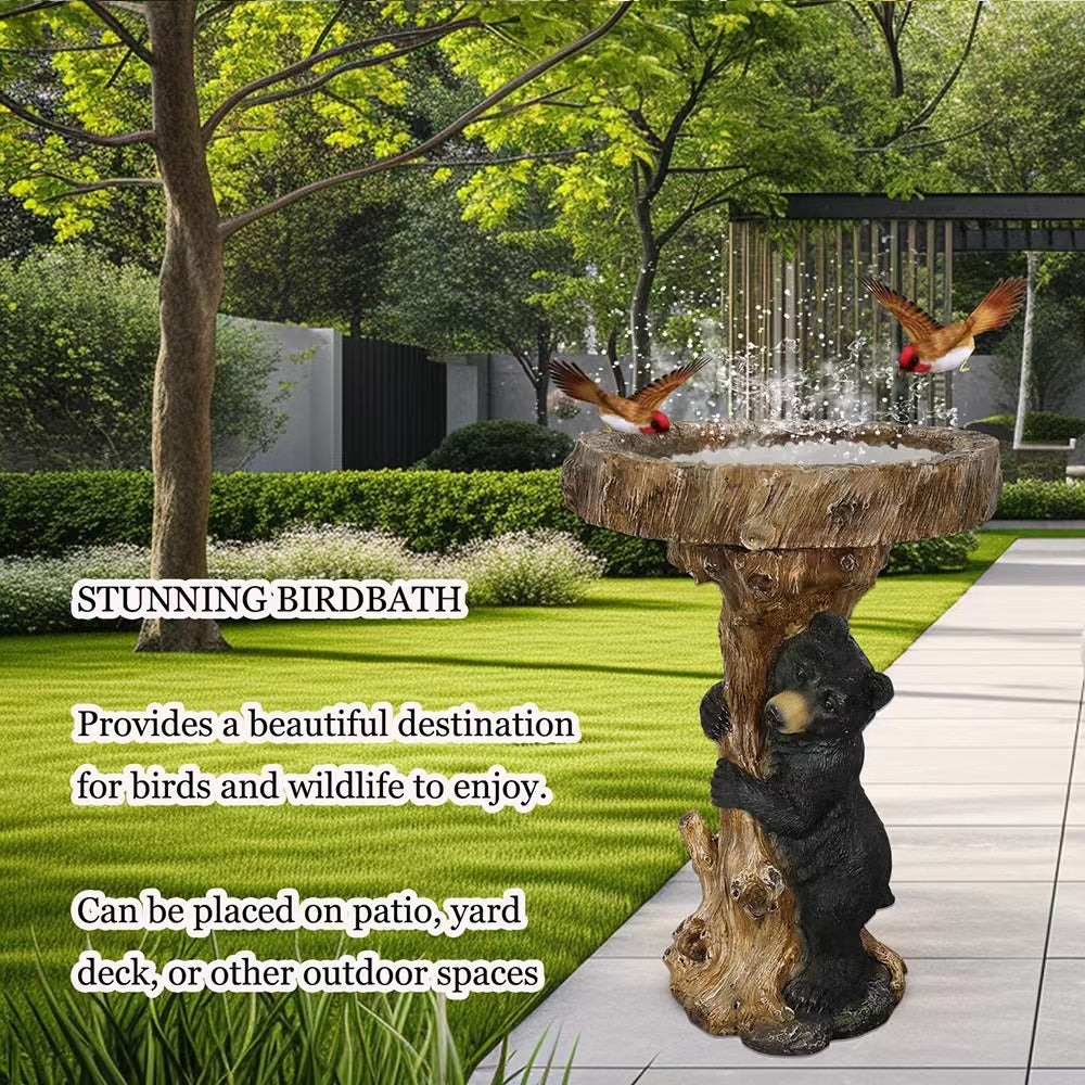 Stunning black bear bird bath attracting wild birds to an outdoor garden.