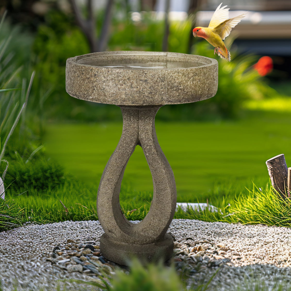 Sturdy 14.5kg sleek modern concrete bird bath providing a reliable sanctuary for birds in a lush yard.