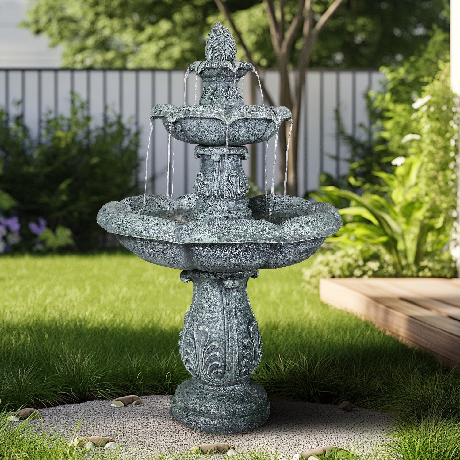 Sturdy 50.5kg heavy-duty water fountain enhancing the ambiance of a lush green manicured lawn.