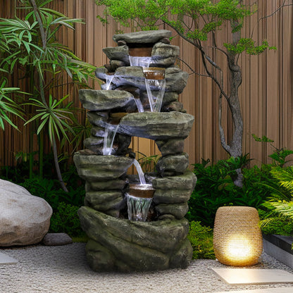 Zen garden corner featuring the 60"H 7-tier glowing rock fountain with relaxing water sounds.