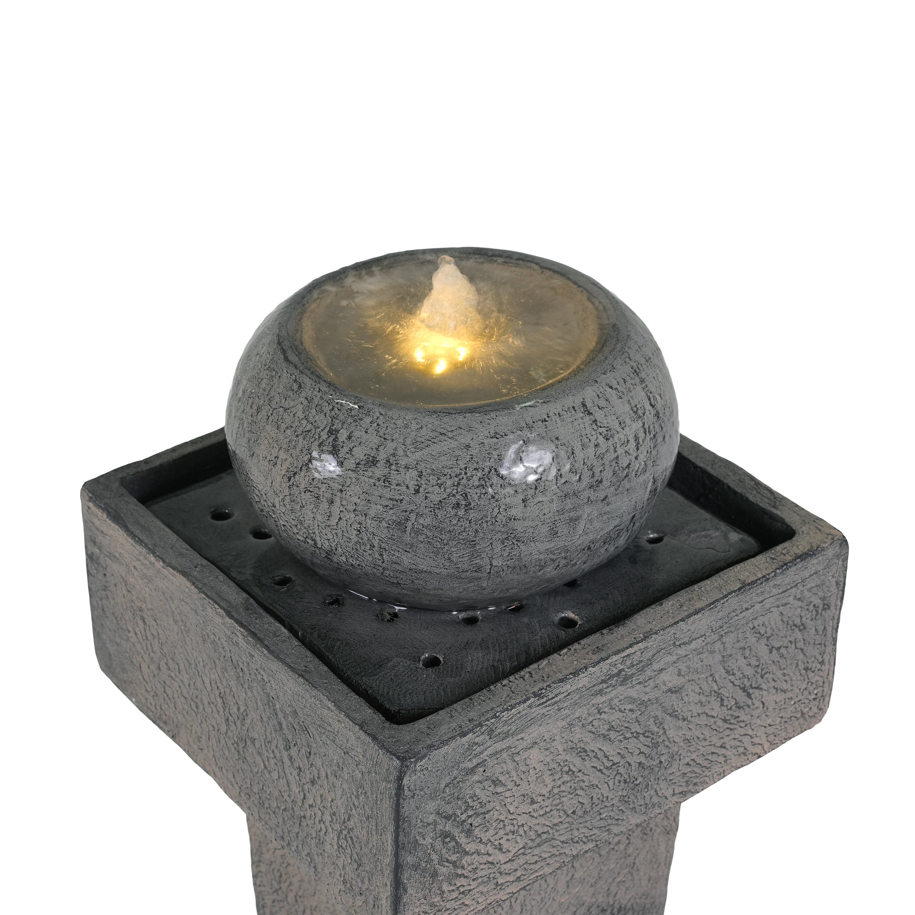 closeup of LED lit sphere in the bowl of concrete column fountain