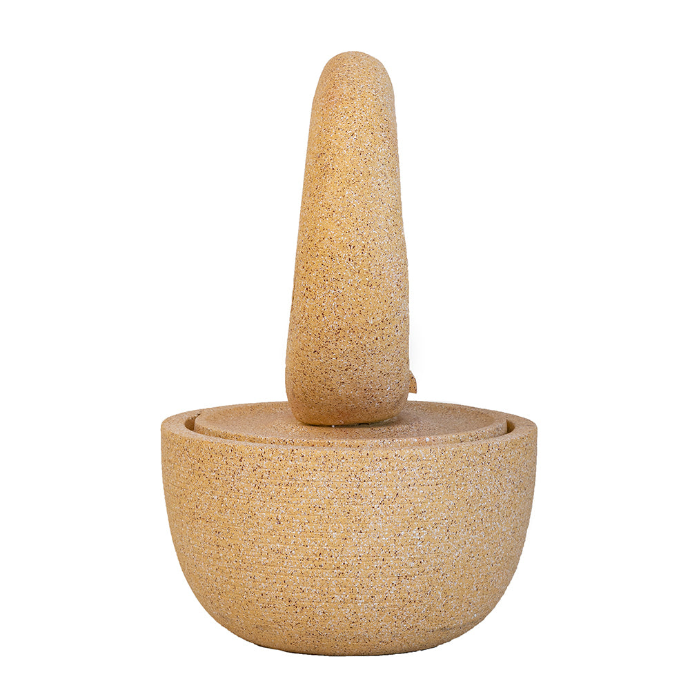 Cream concrete ring fountain with the ring lifted out of its bowl base