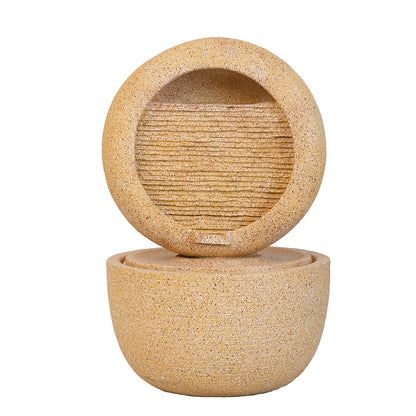 cream cement halo fountain with ribbed cascade face over round basin